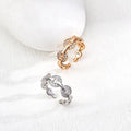 Knot-shaped Zircon Ring Glim Wink