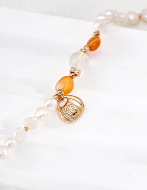 Red Agate Fortune Pouch Pearl Bracelet Glim Wink