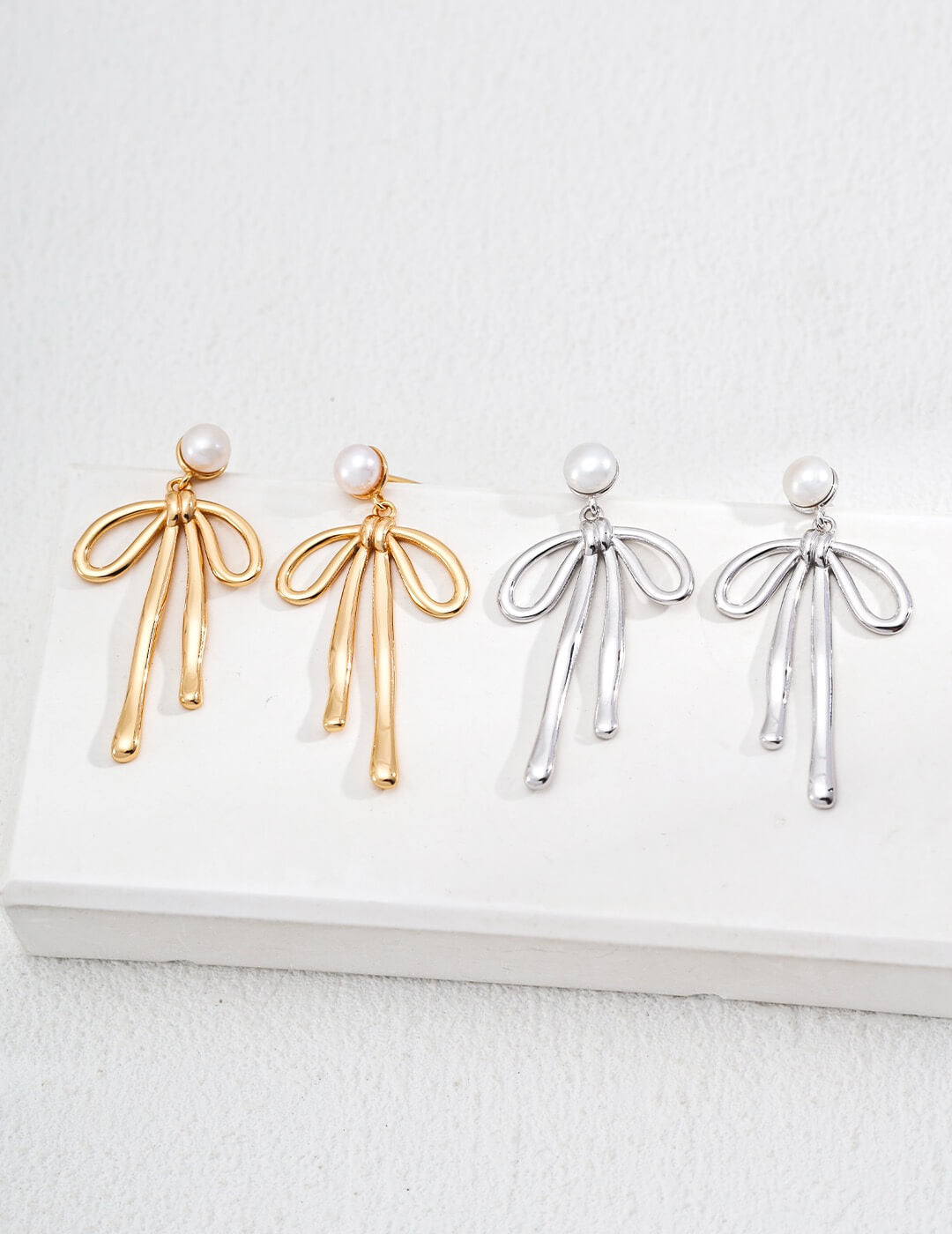 Bowknot Earrings Glim Wink