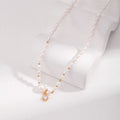 Zircon Pendant Pearl Necklace Glim Wink